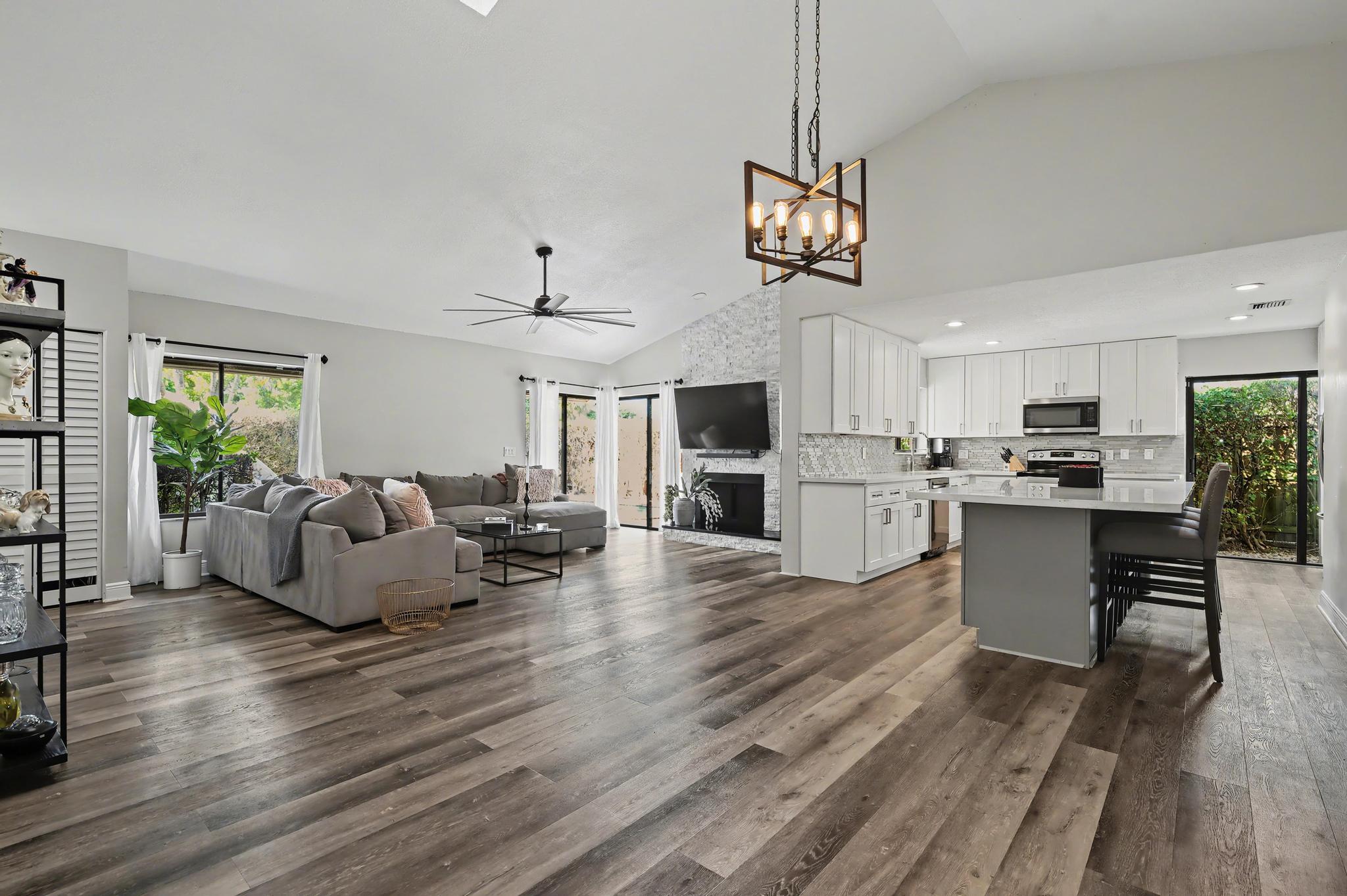 7855 Stanway Place Boca Raton, FL 33433 - Photo 9 of 24 a living room with furniture kitchen view and a wooden floor