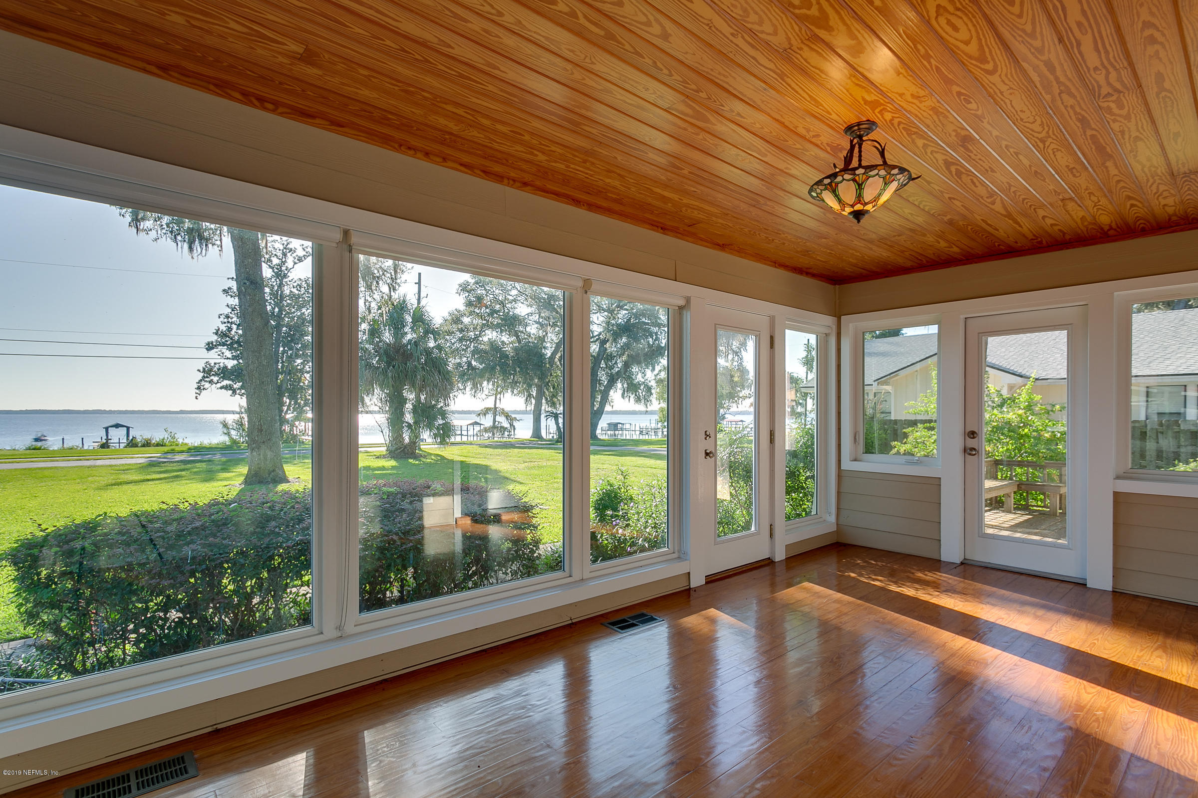 832 River Road Orange Park, FL 32073 - Photo 4 of 61 4-Glassed Front Porch