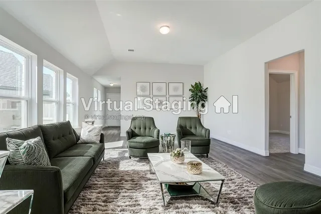 a living room with furniture a rug and a window
