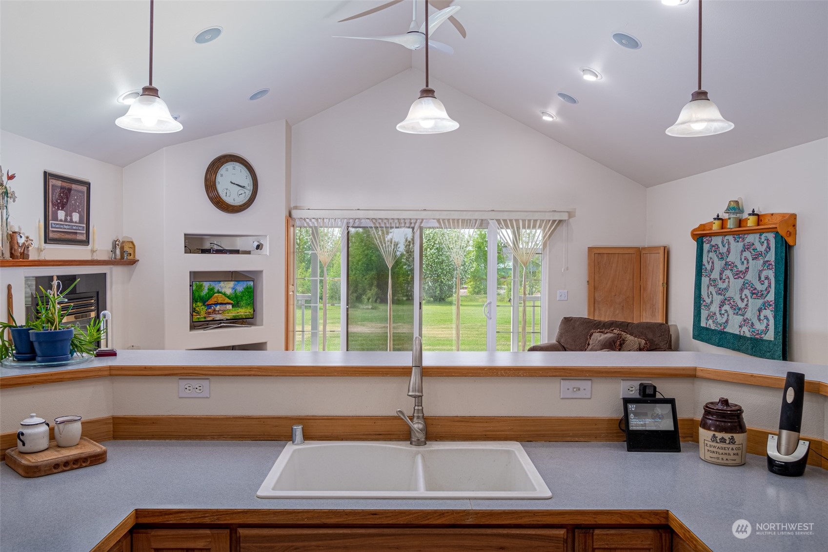 12872 Rd B.7 Northwest Ephrata, WA 98823 - Photo 11 of 33 a kitchen with a refrigerator a sink and a large window