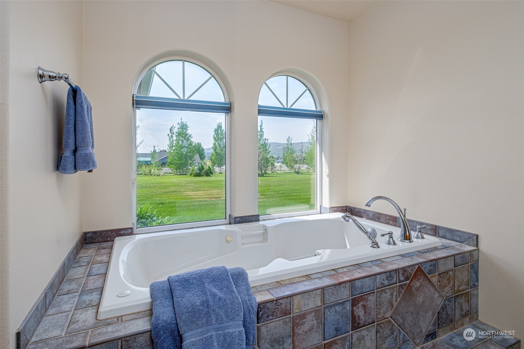 12872 Rd B.7 Northwest Ephrata, WA 98823 - Photo 14 of 33 a bathroom with a granite countertop sink and a window