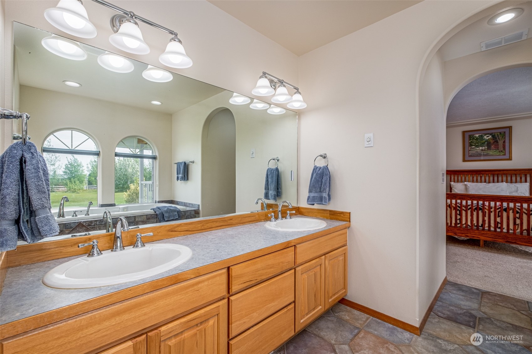12872 Rd B.7 Northwest Ephrata, WA 98823 - Photo 15 of 33 a bathroom with a double vanity sink and a mirror