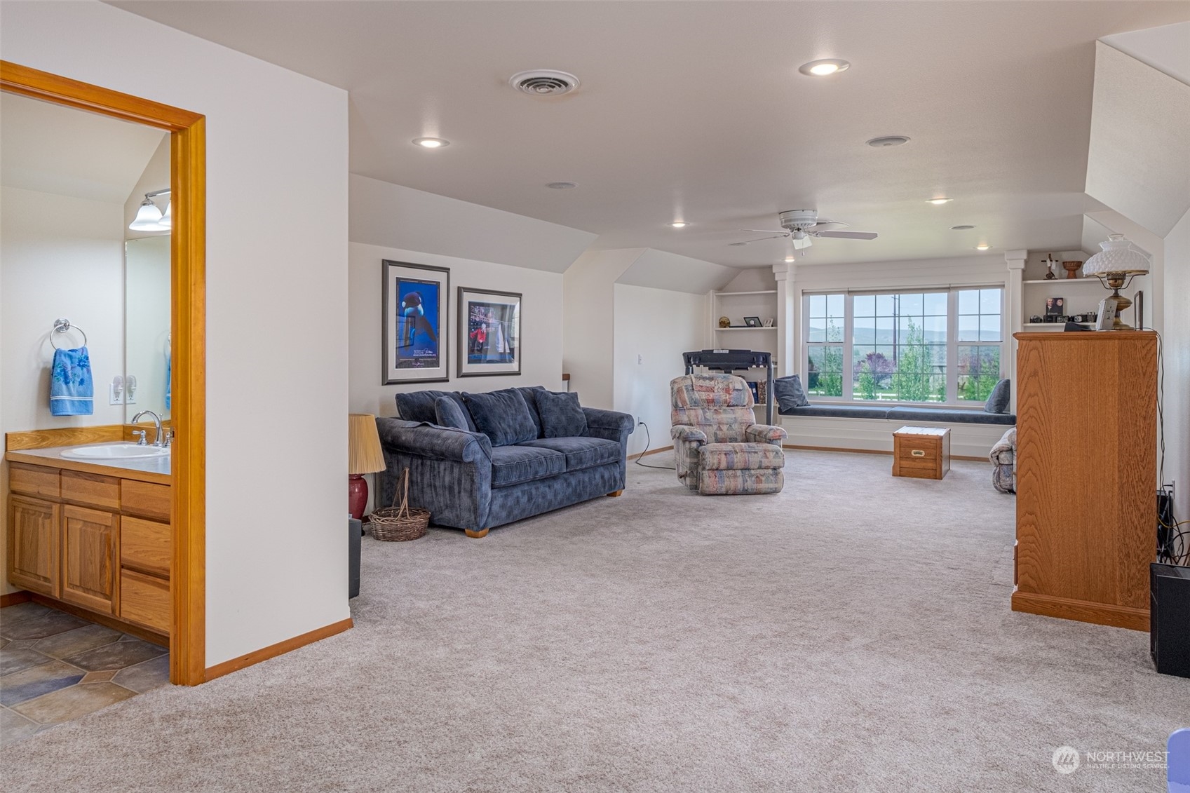 12872 Rd B.7 Northwest Ephrata, WA 98823 - Photo 20 of 33 a living room with furniture and a large window