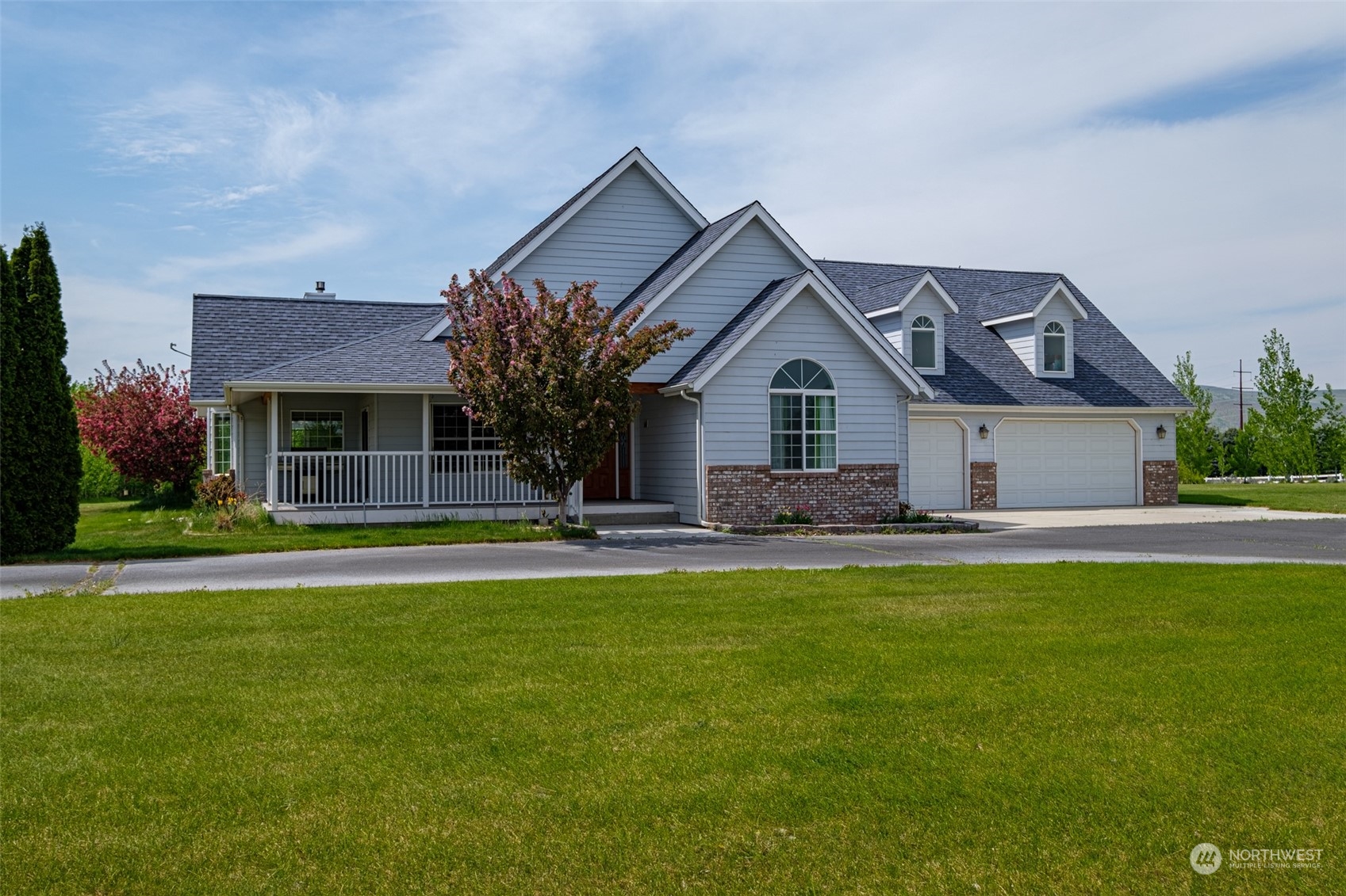 12872 Rd B.7 Northwest Ephrata, WA 98823 - Photo 25 of 33 a front view of a house with swimming pool having outdoor seating