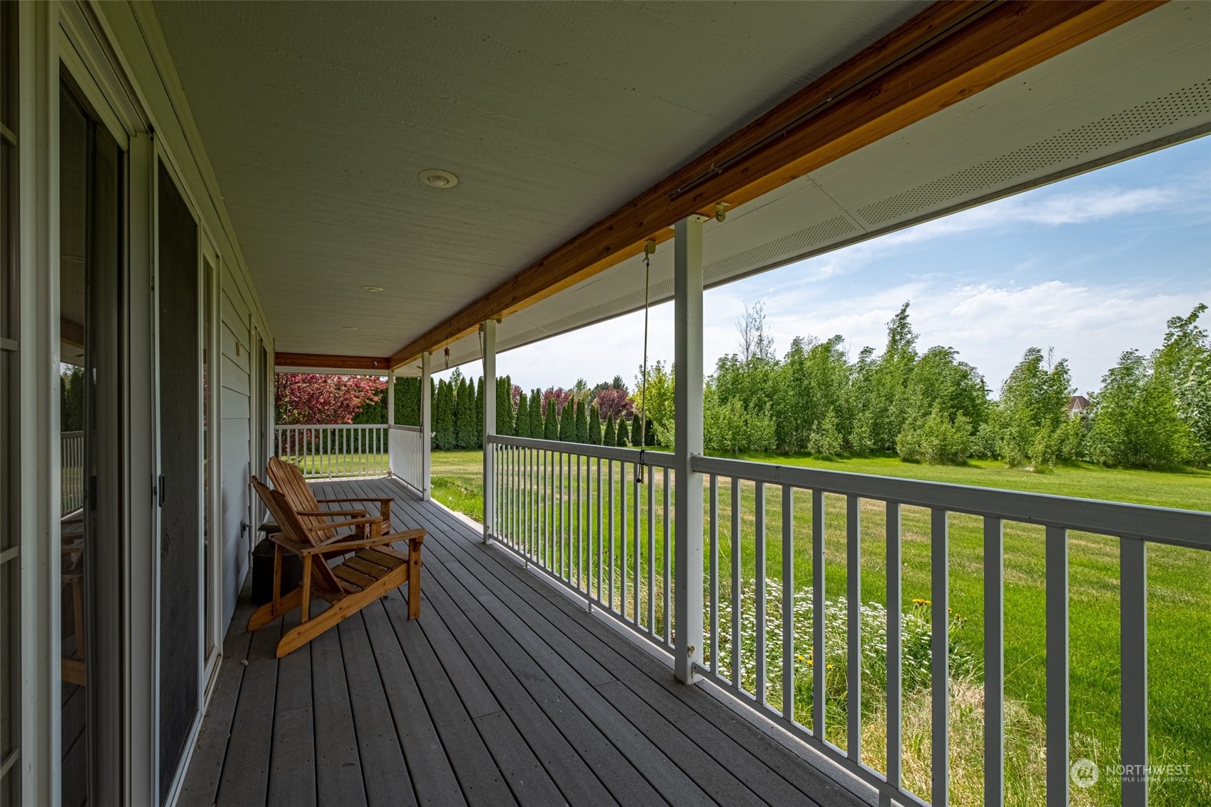 12872 Rd B.7 Northwest Ephrata, WA 98823 - Photo 26 of 33 a view of a balcony with chairs and wooden floor