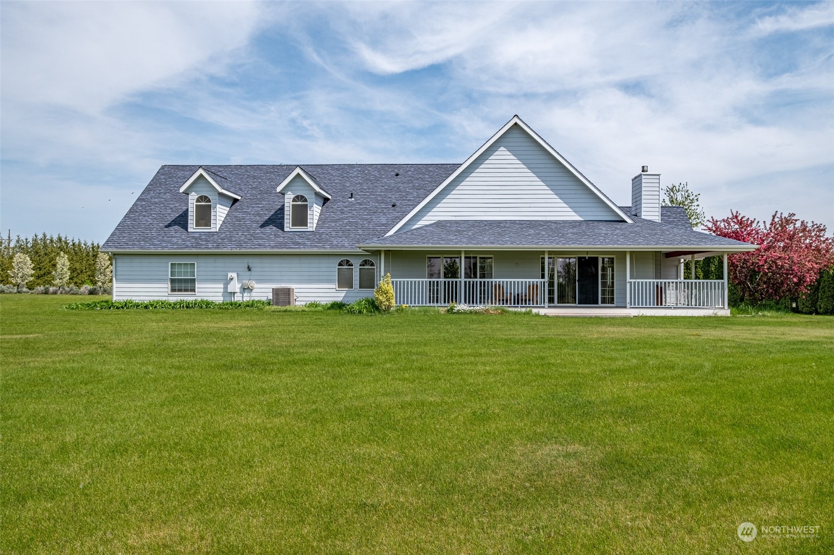 12872 Rd B.7 Northwest Ephrata, WA 98823 - Photo 27 of 33 a front view of a house with a garden