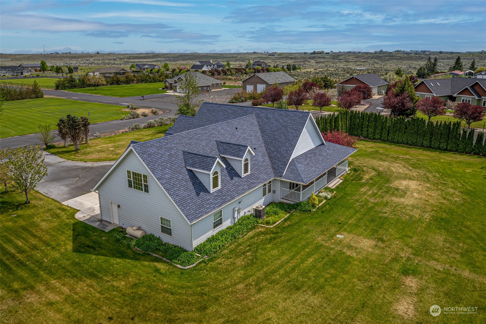 12872 Rd B.7 Northwest Ephrata, WA 98823 - Photo 29 of 33 an aerial view of a house with a garden and lake view