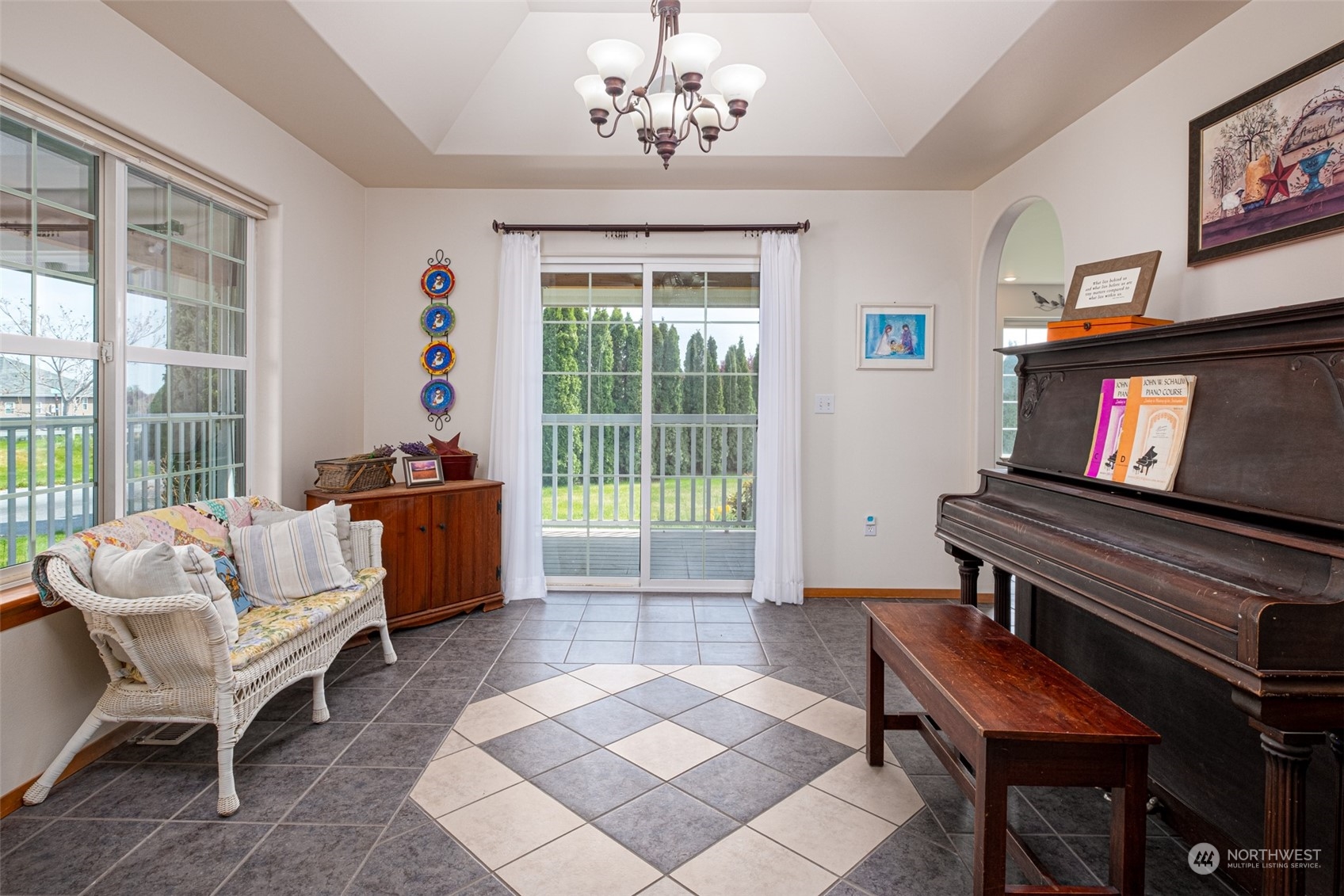 12872 Rd B.7 Northwest Ephrata, WA 98823 - Photo 5 of 33 a living room with furniture a piano and a flat screen tv