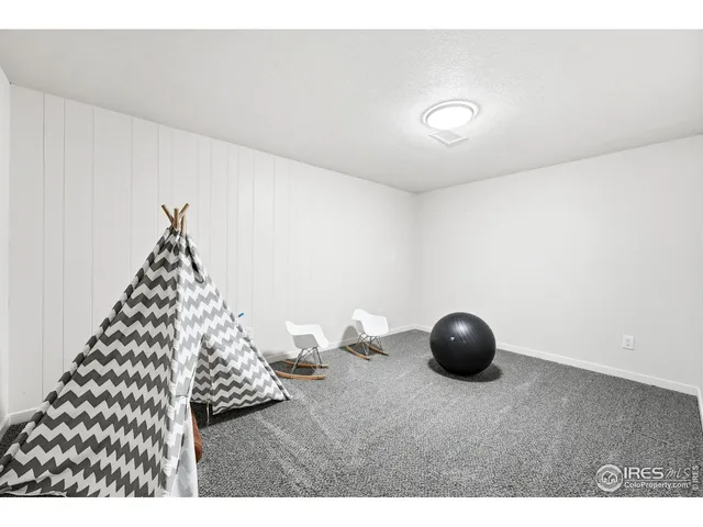 a view of a livingroom with wooden floor
