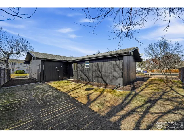 a view of a backyard of a house