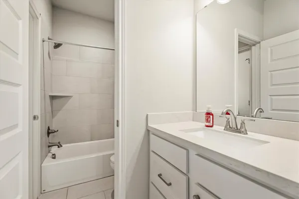 a bathroom with a sink and a bathtub