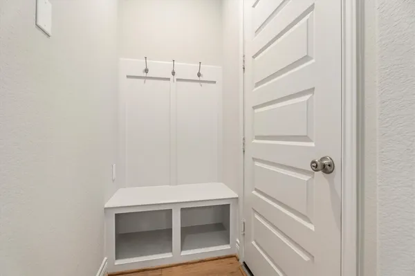 a bathroom with a shower and toilet