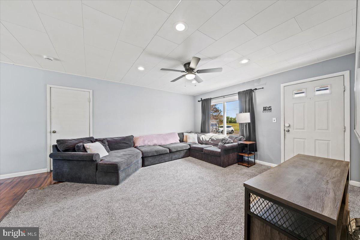 3 High Ridge Drive Pemberton, NJ 08068 - Photo 3 of 24 a living room with furniture and a ceiling fan