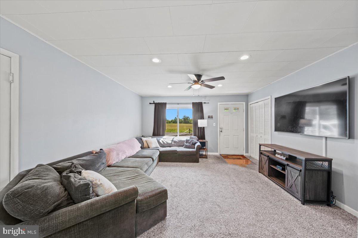 3 High Ridge Drive Pemberton, NJ 08068 - Photo 4 of 24 a living room with furniture and a flat screen tv