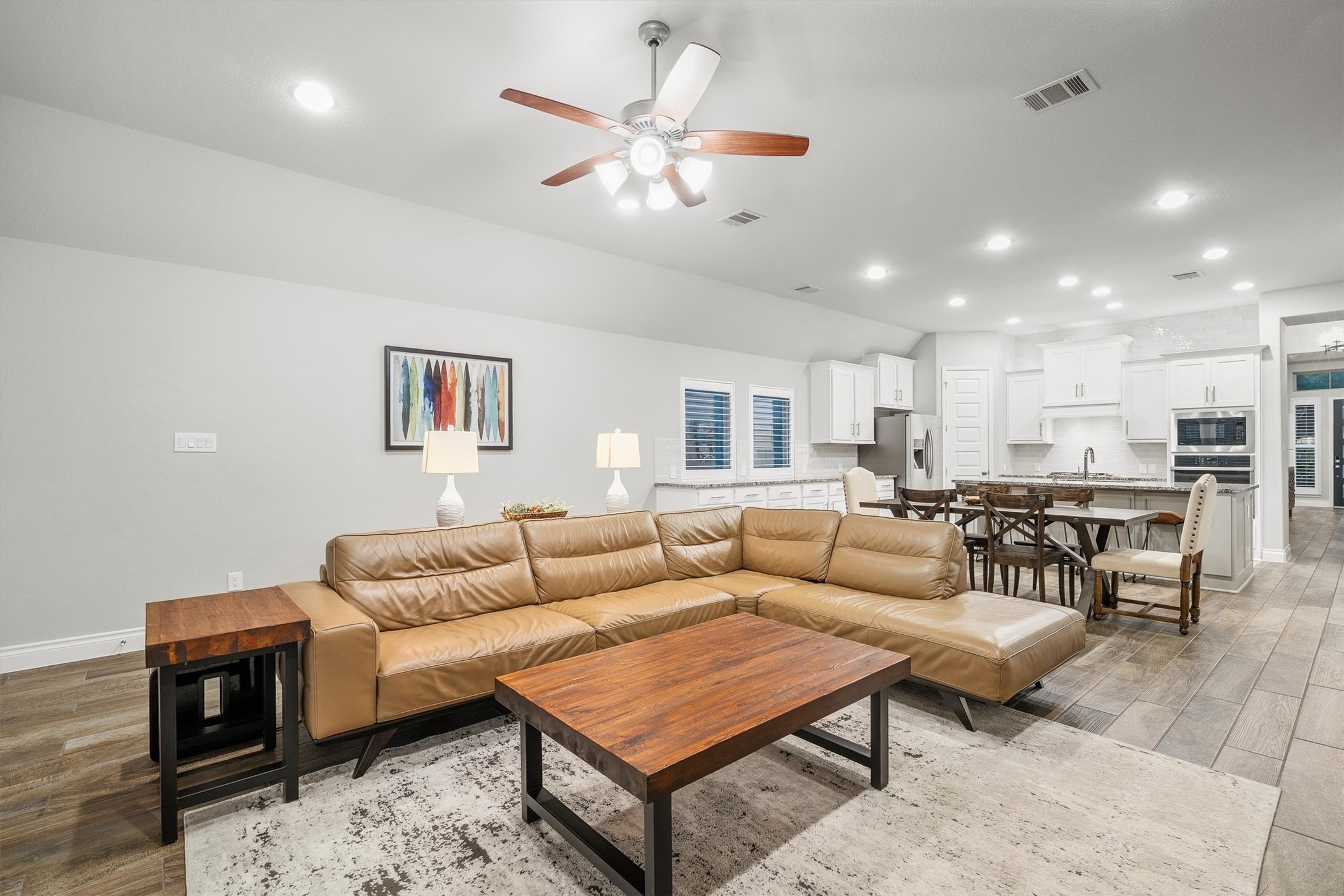 29118 Lantana Ridge Court Fulshear, TX 77441 - Photo 28 of 29 This open floor plan creates a seamless flow between living spaces, making entertaining effortless and enjoyable.