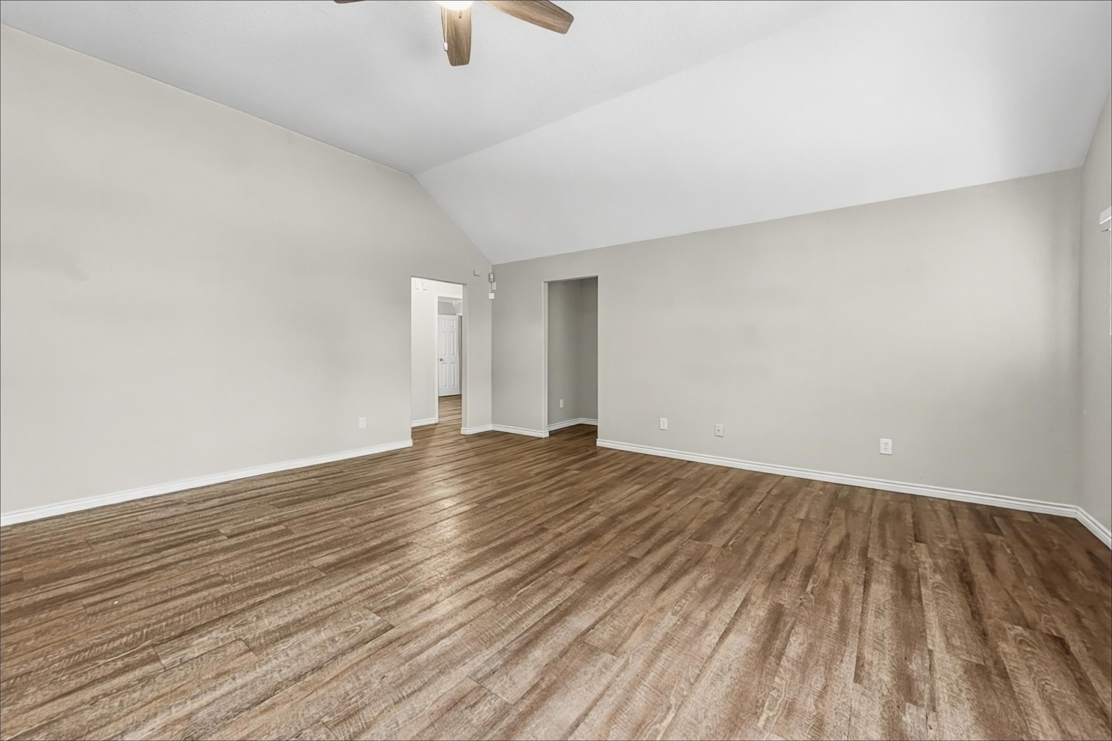 2423 Lofty Falls Court Spring, TX 77386 - Photo 8 of 15 a view of an empty room with wooden floor