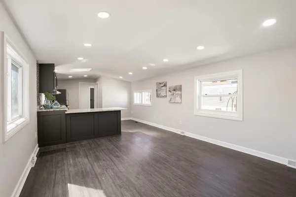 a view of kitchen with wooden floor