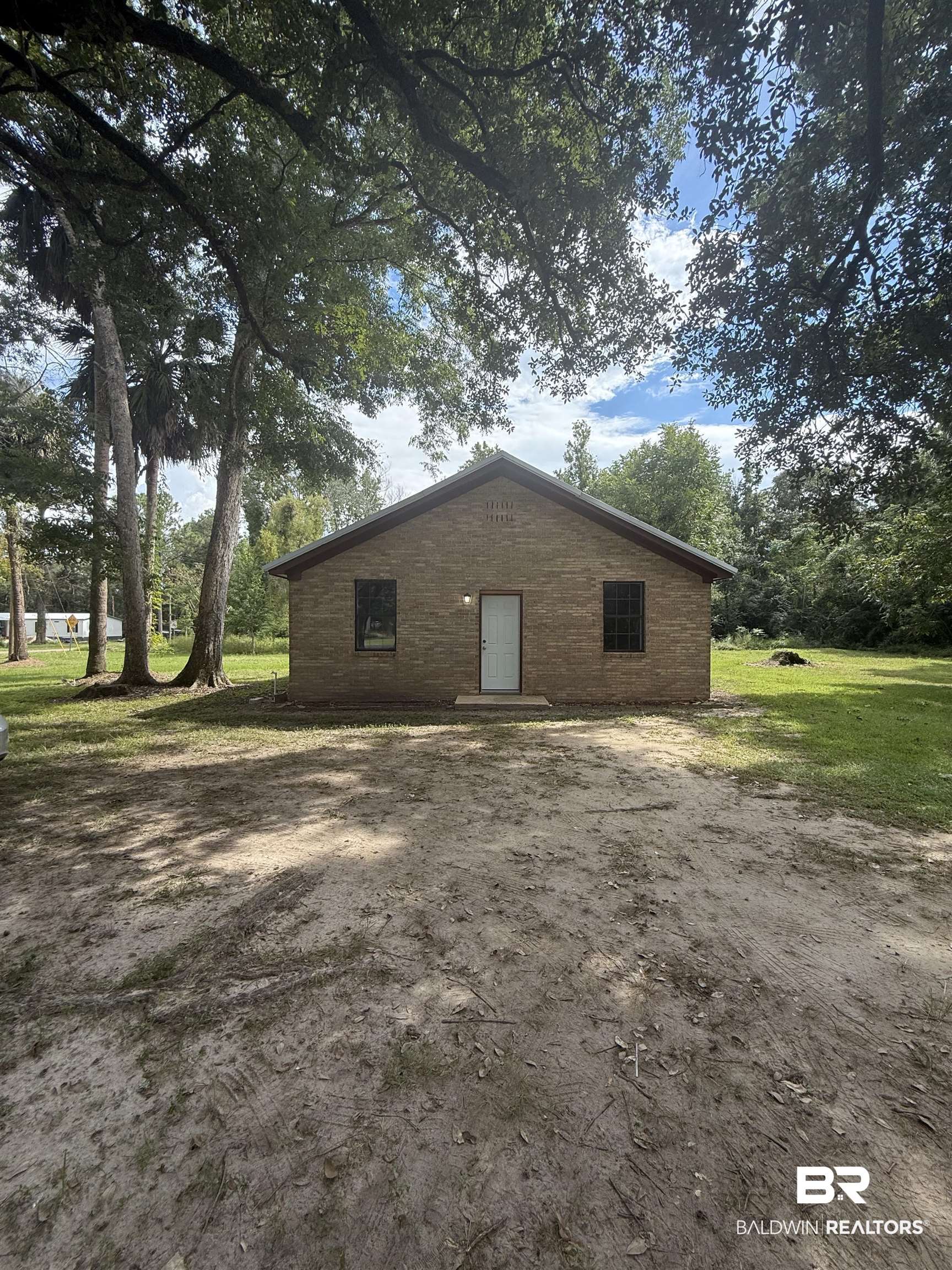 17440 Old Brady Road Bay Minette, AL 36507 - Photo 2 of 9 View of front of home featuring a yard