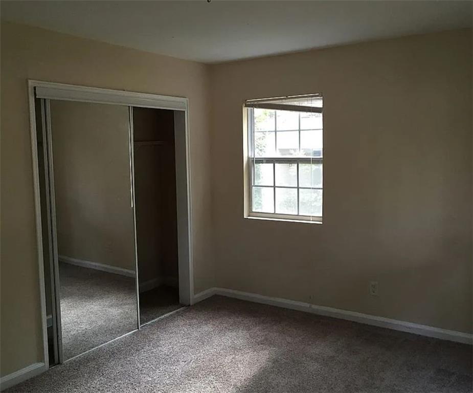 4097 Clay Drive Atlanta, GA 30360 - Photo 6 of 8 an empty room with windows