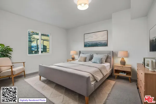 a bedroom with bed and a window