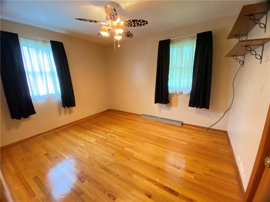 643 Methodist Road Greenville, PA 16125 - Photo 32 of 48 a view of a room with wooden floor and staircase