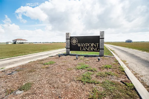 a sign on the side of the road