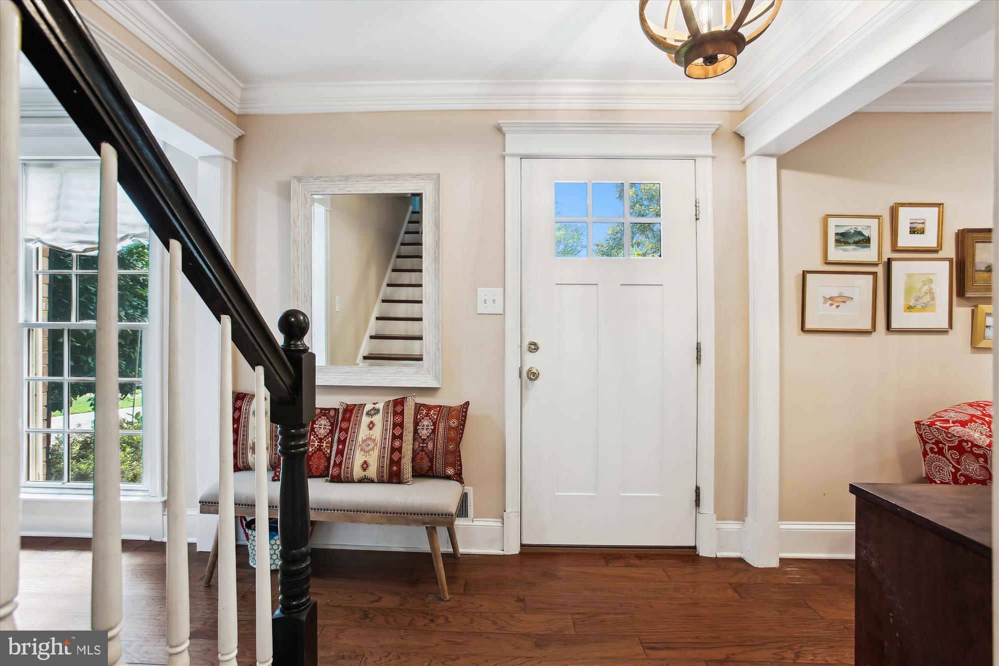 8231 Crown Court Road Alexandria, VA 22308 - Photo 2 of 33 a view of an entryway with wooden floor and stairs