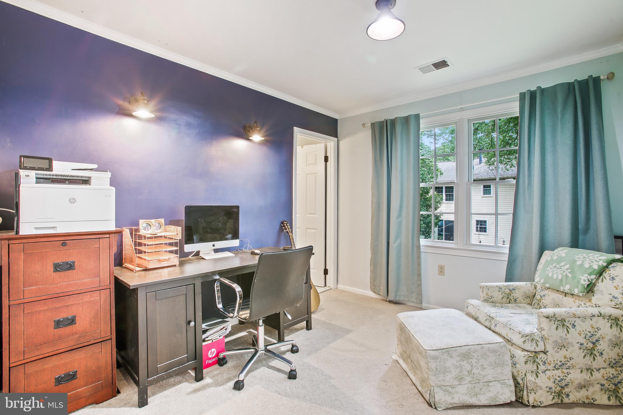 8231 Crown Court Road Alexandria, VA 22308 - Photo 21 of 33 a view of a workspace with furniture and a window