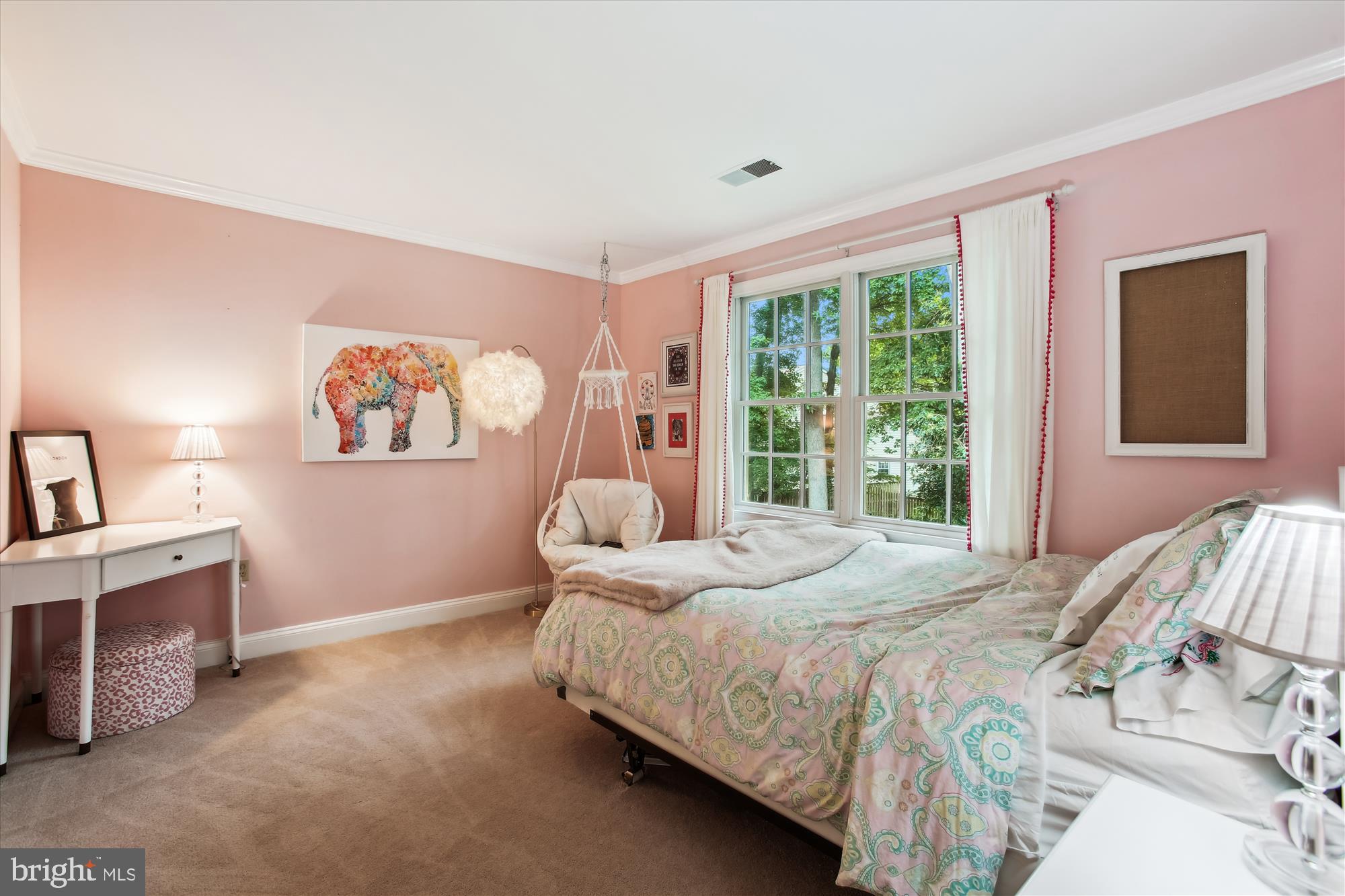 8231 Crown Court Road Alexandria, VA 22308 - Photo 27 of 33 a bedroom with a bed and a window