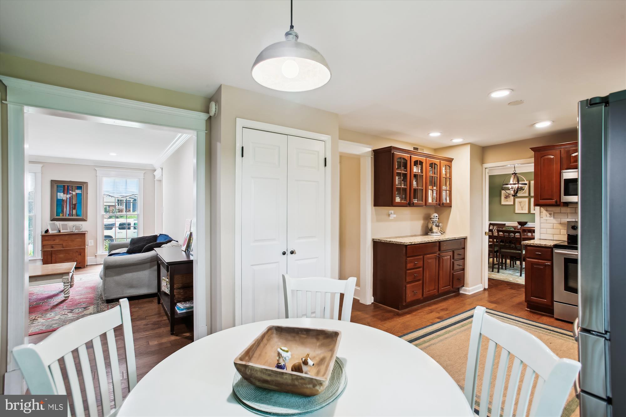 8231 Crown Court Road Alexandria, VA 22308 - Photo 7 of 33 a living room with furniture and a flat screen tv