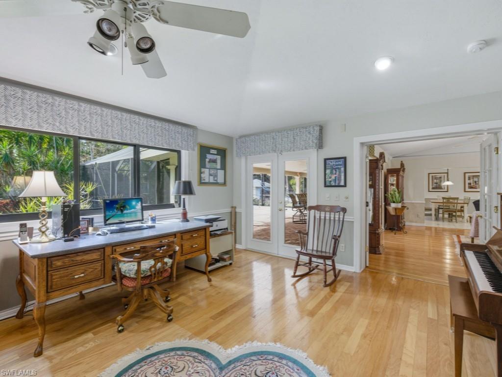 6840 Sable Ridge Lane Naples, FL 34109 - Photo 32 of 38 Bedroom/office featuring french doors, light wood-style floors, and ceiling fan