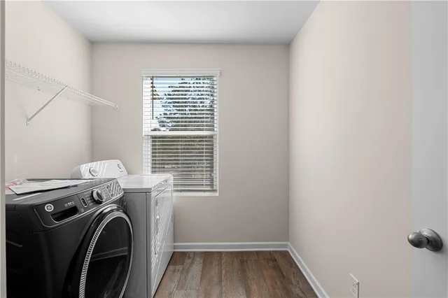 a view of dirt yard with a large tree