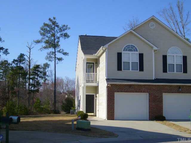 2352 Persimmon Ridge Drive Raleigh, NC 27604 - Photo 1 of 12 a front view of a house with a yard