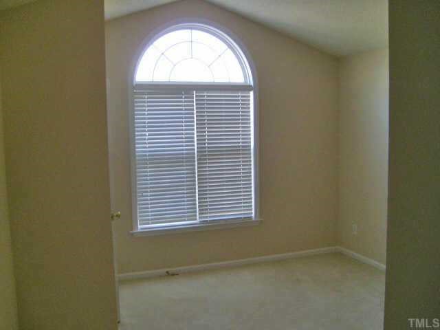 2352 Persimmon Ridge Drive Raleigh, NC 27604 - Photo 8 of 12 an empty room with a window