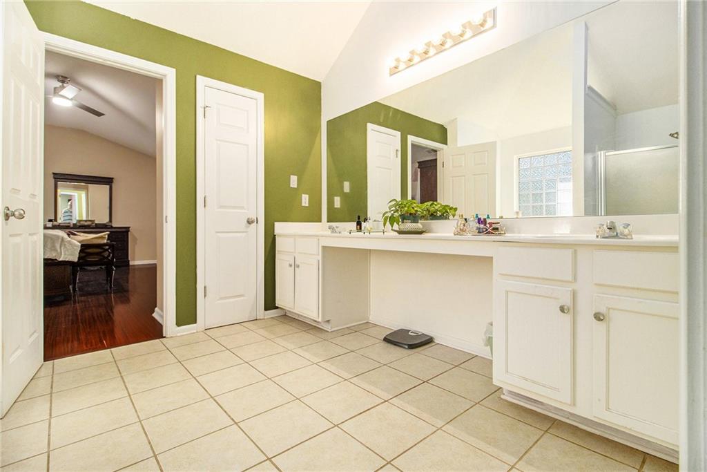 5139 Miller Woods Trail Decatur, GA 30035 - Photo 23 of 36 a room with a sink and cabinets