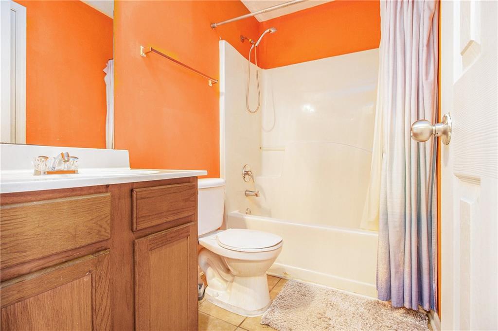 5139 Miller Woods Trail Decatur, GA 30035 - Photo 31 of 36 a bathroom with a sink a toilet and shower