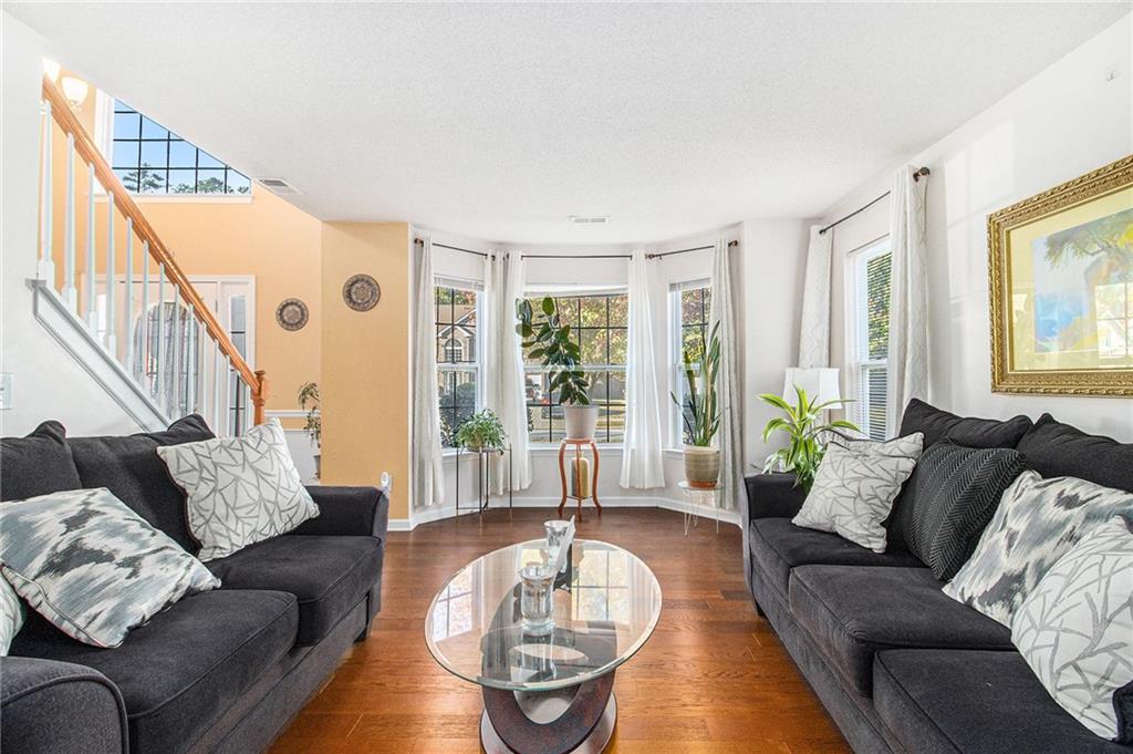 5139 Miller Woods Trail Decatur, GA 30035 - Photo 7 of 36 a living room with furniture and a large window