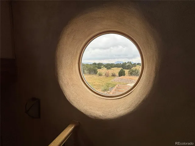 a bathroom with a shower and a sink
