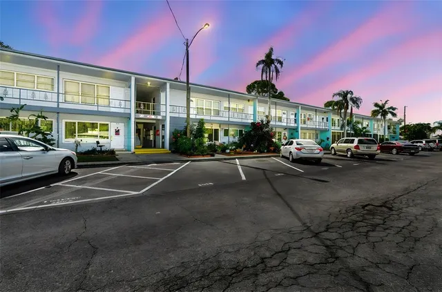 a cars parked in front of a building