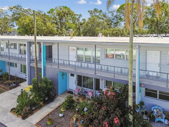 a view of a city with lawn chairs
