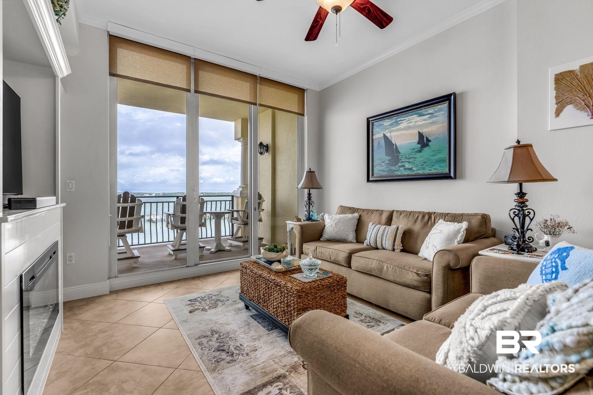 14500 River Road, Unit 305 Pensacola, FL 32507 - Photo 6 of 42 Living area featuring large glass sliding doors opening to a private balcony