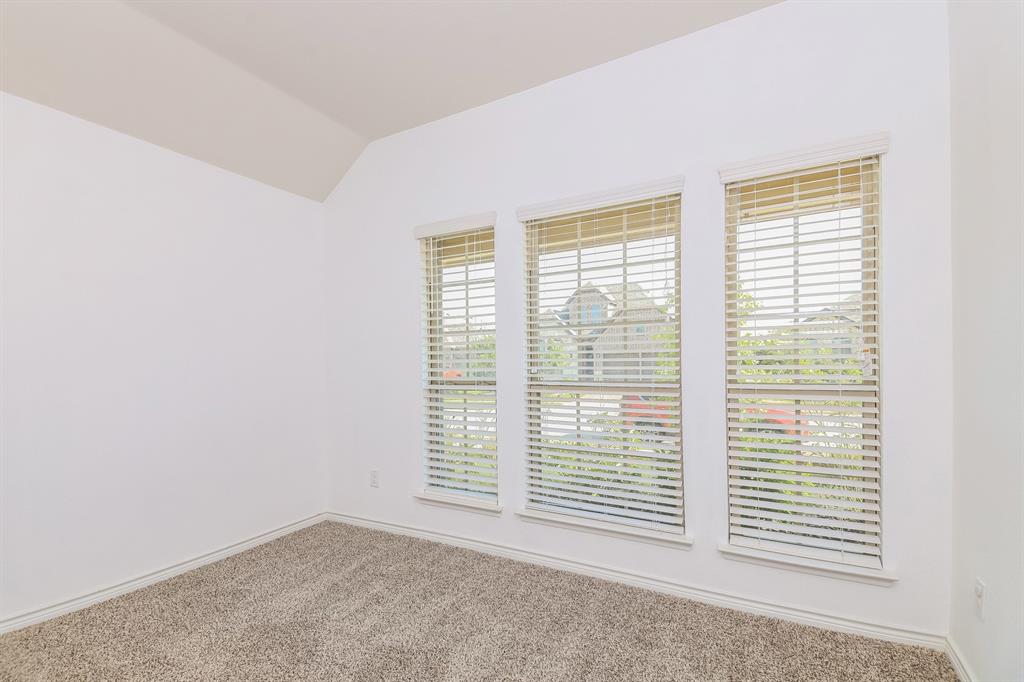 574 Kara Drive Fate, TX 75087 - Photo 10 of 15 a view of a room with a large window