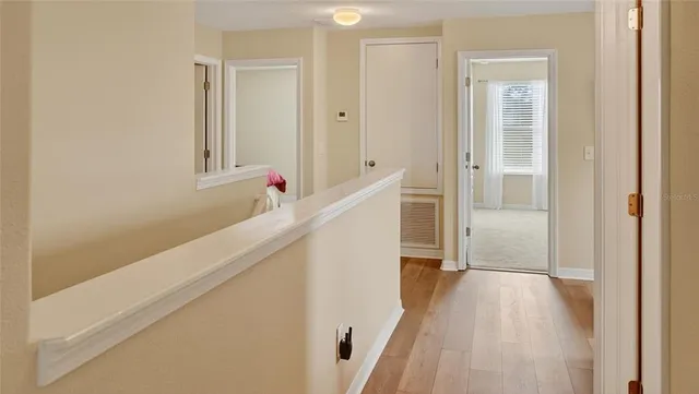 a living room with a couch and a large window