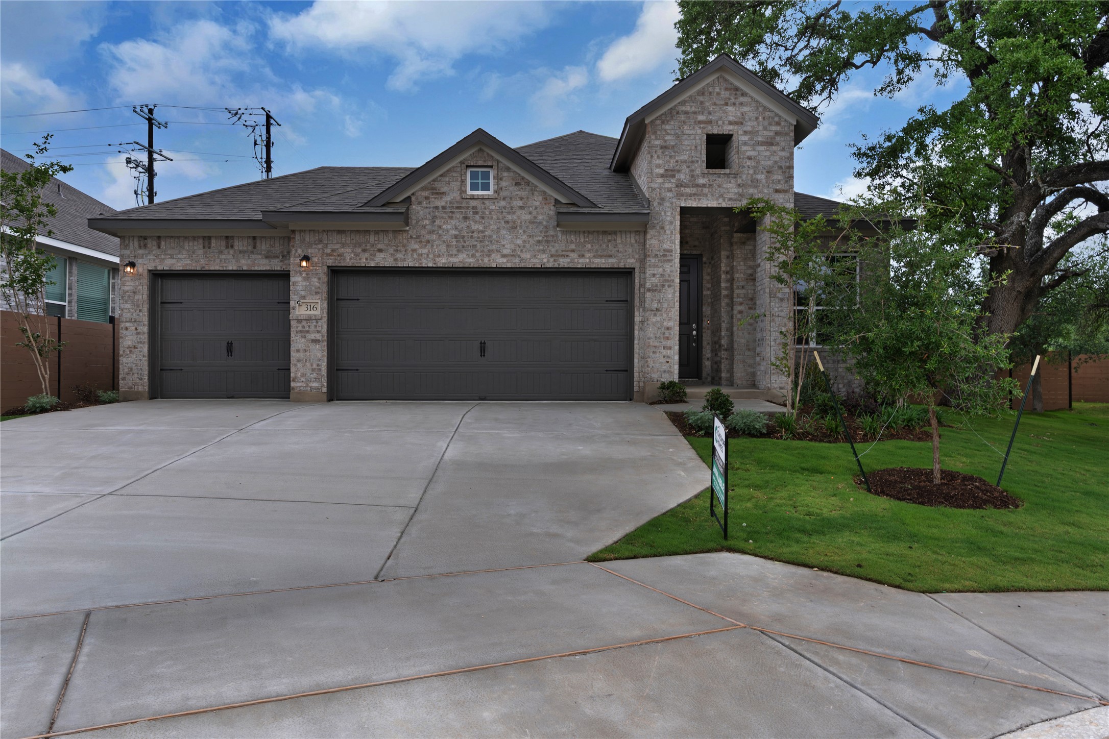 316 Ridgewell Loop Georgetown, TX 78633 - Photo 1 of 25 a front view of a house with garden