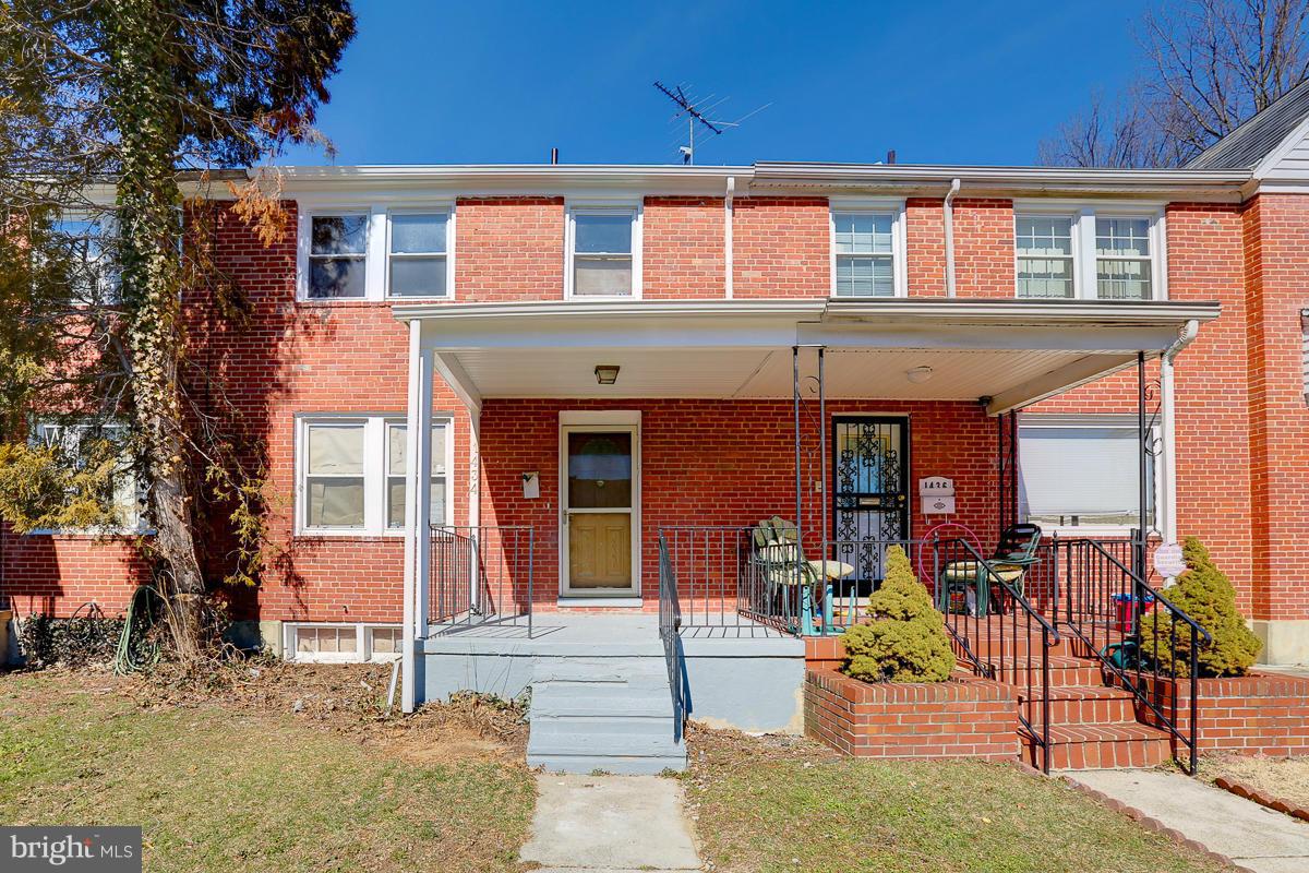 1434 Stonewood Road Baltimore, MD 21239 - Photo 1 of 28 front view of a building