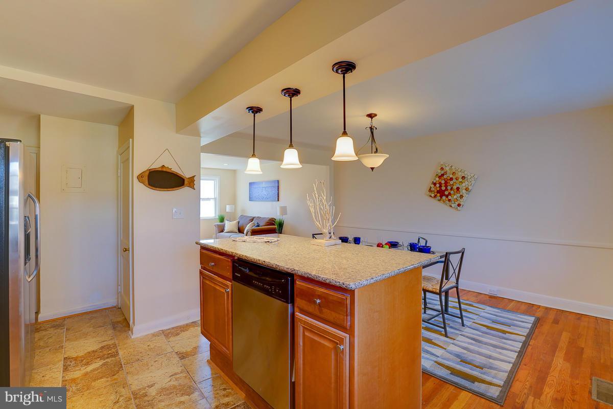 1434 Stonewood Road Baltimore, MD 21239 - Photo 18 of 28 a view of a kitchen counter space and stainless steel appliances