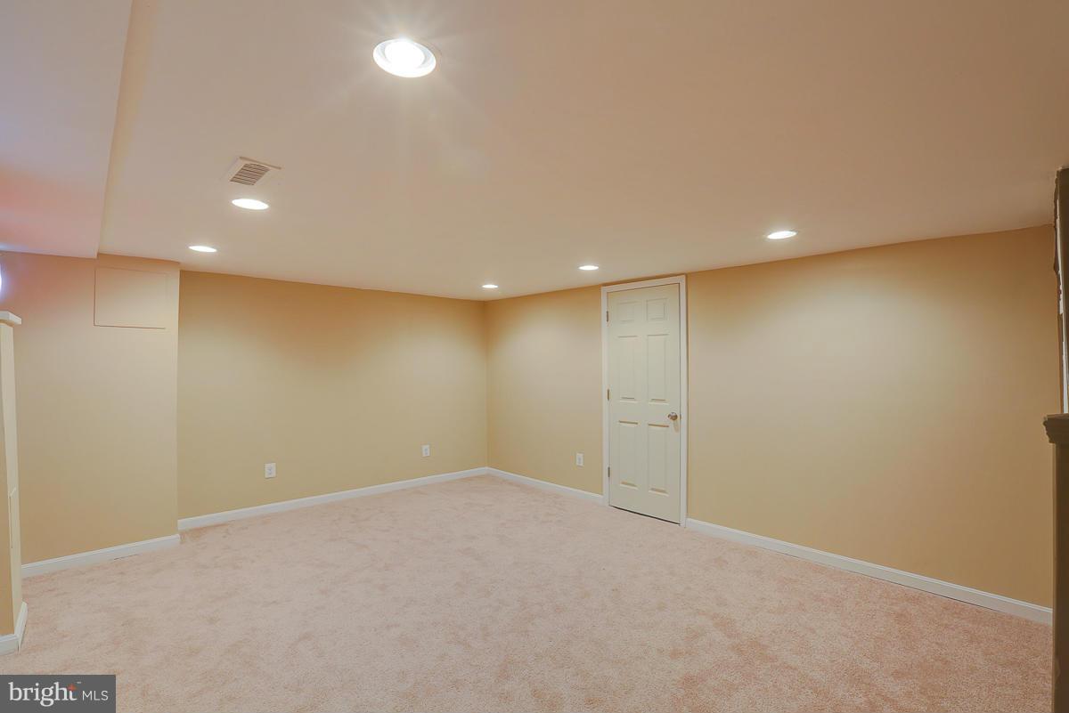 1434 Stonewood Road Baltimore, MD 21239 - Photo 19 of 28 a view of an empty room