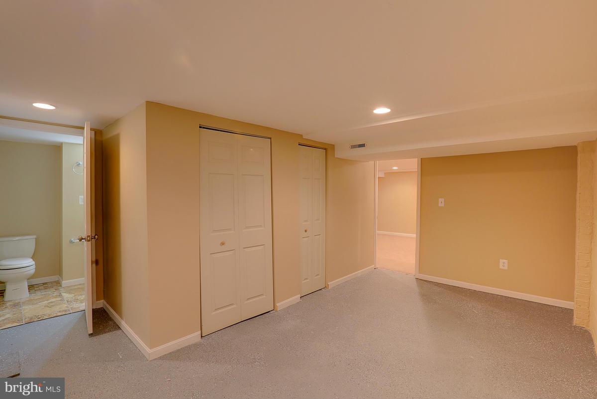 1434 Stonewood Road Baltimore, MD 21239 - Photo 20 of 28 a view of an empty room