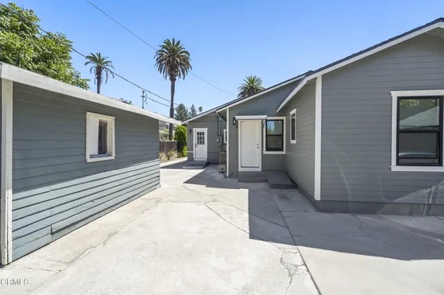 a front view of a house with a garage