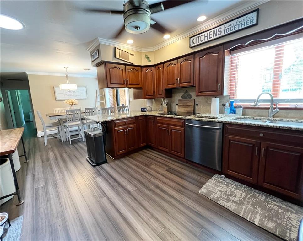 92 Blom Road Grove City, PA 16127 - Photo 18 of 28 a kitchen with lots of counter top space and wooden floor